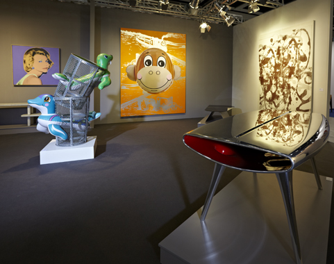 Seal Walrus Trashcans and Monkey Train (Orange) by Jeff Koons. Hong Kong International Art Fair, L&M Arts, 2011.